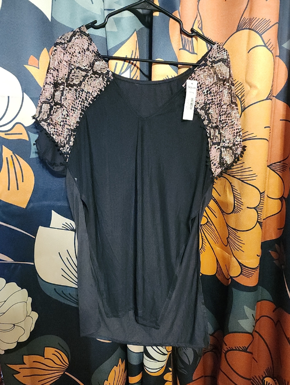 Yandy Black Top with Pink Snake-Print Sleeves